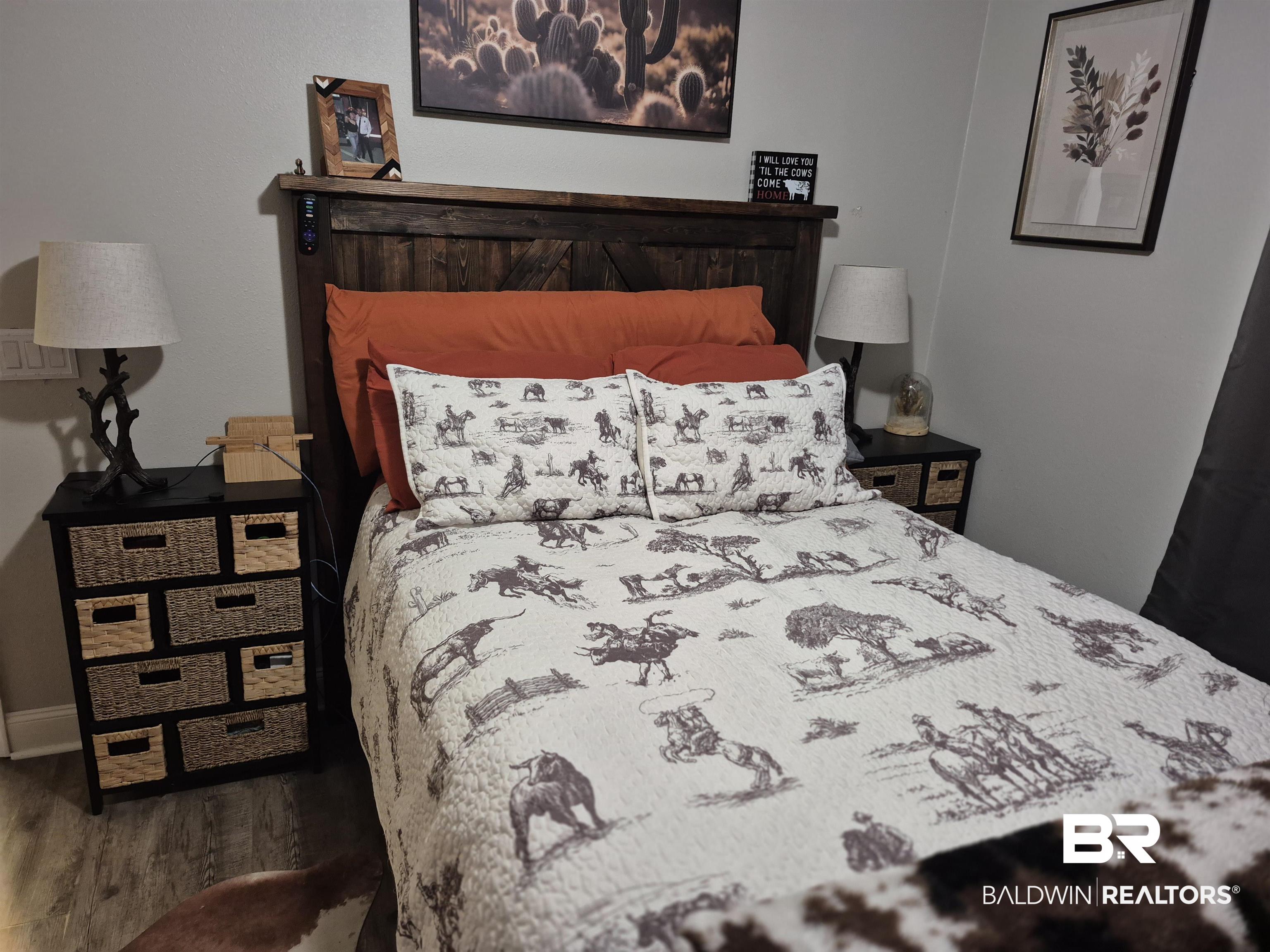 24681 Olive Street Elberta, AL 36530 - Photo 21 of 22 Bedroom featuring wood finished floors and baseboards
