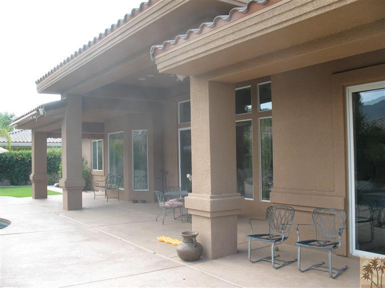 6 Varsity Circle Rancho Mirage, CA 92270 - Photo 16 of 21 a view of a patio with table and chairs