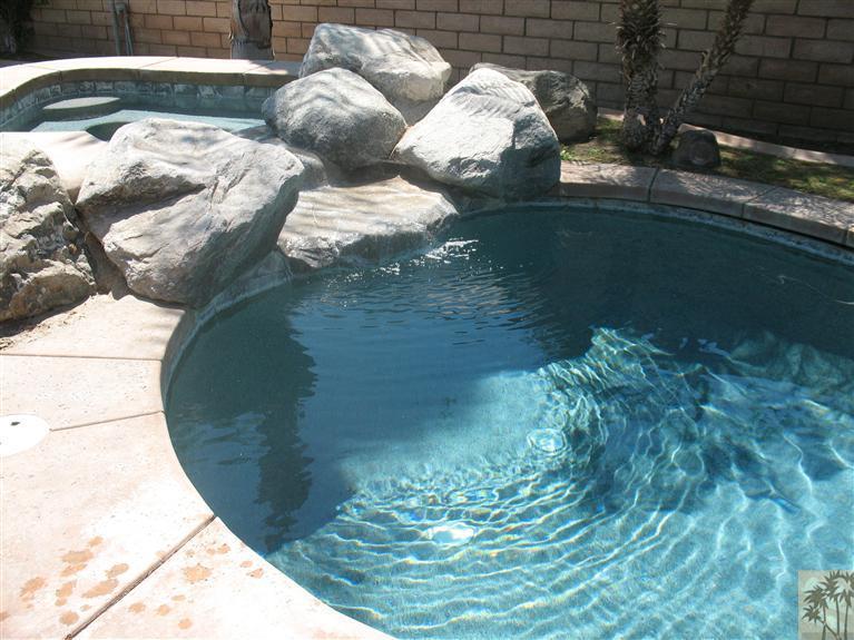 6 Varsity Circle Rancho Mirage, CA 92270 - Photo 17 of 21 a close view of water heater in the backyard