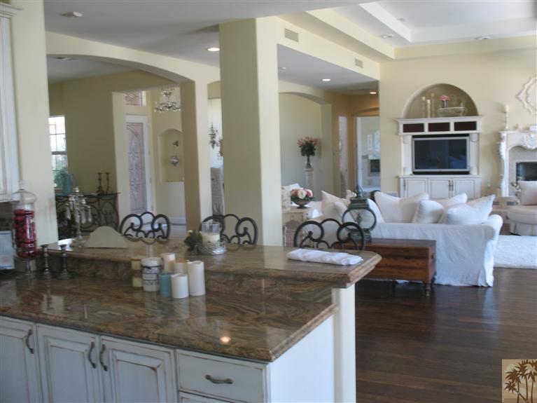6 Varsity Circle Rancho Mirage, CA 92270 - Photo 2 of 21 a kitchen with a stove a sink and a wooden floors