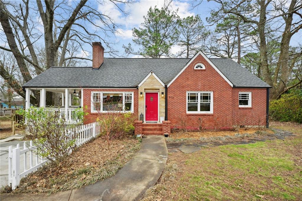 976 Bouldercrest Drive Southeast Atlanta, GA 30316 - Photo 1 of 1 a front view of a house with a yard