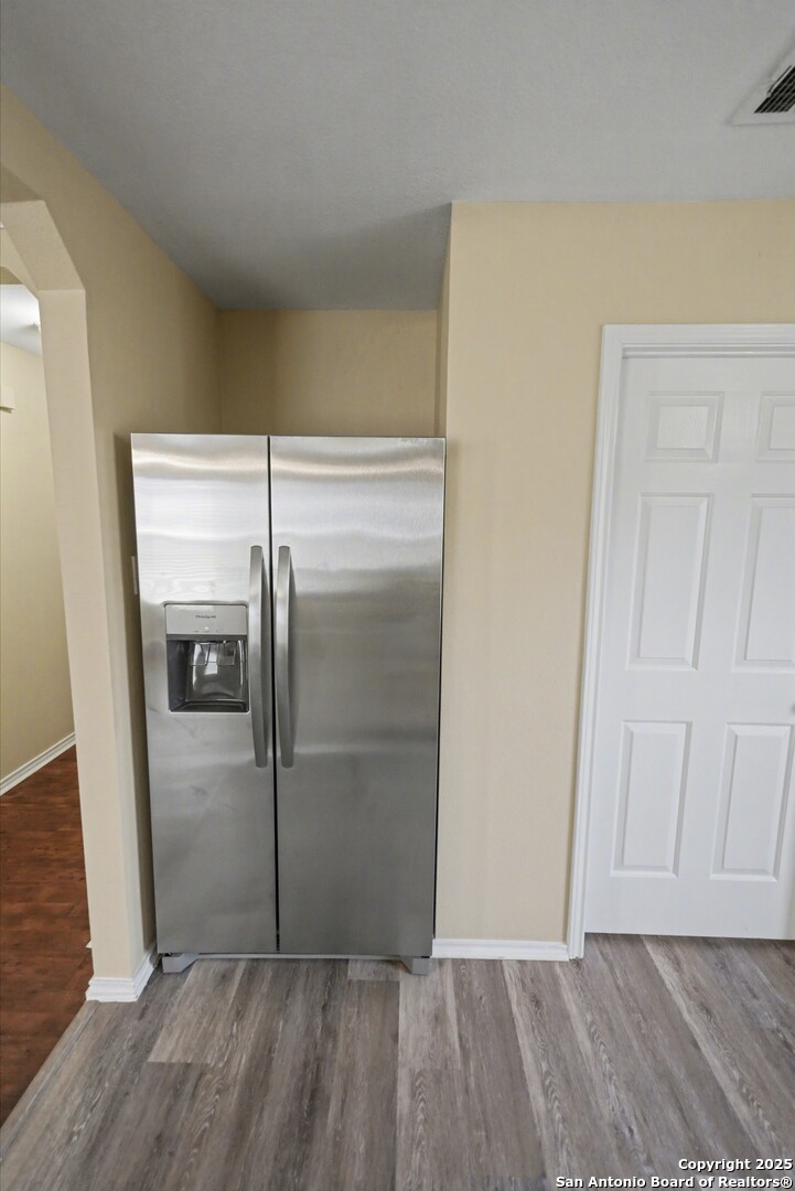 112 Stream Crossing Cibolo, TX 78108 - Photo 15 of 38 an empty room with wooden floor