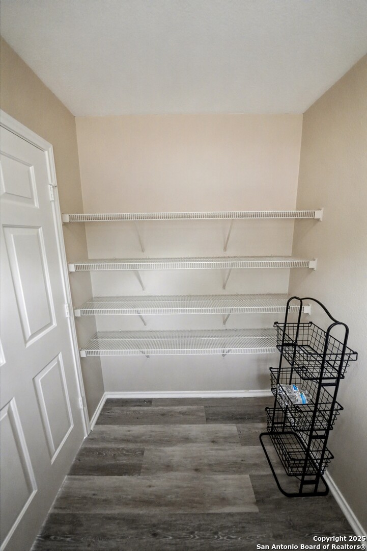 112 Stream Crossing Cibolo, TX 78108 - Photo 18 of 38 a view of entryway with wooden floor