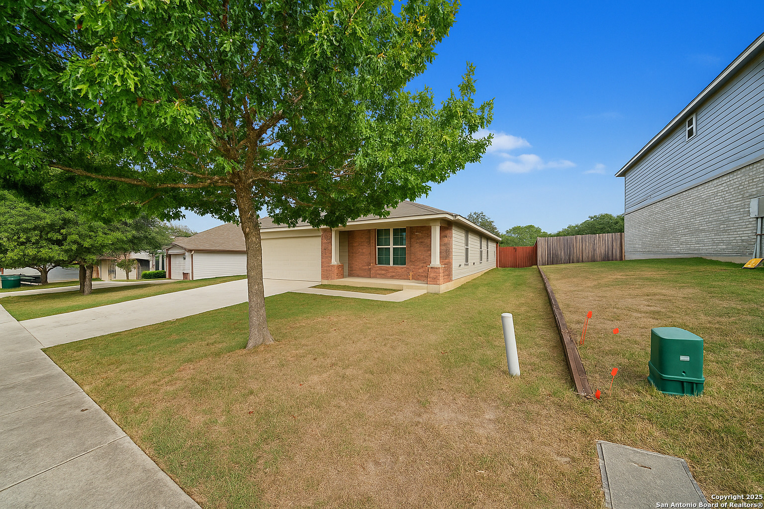 112 Stream Crossing Cibolo, TX 78108 - Photo 6 of 38 a view of a house with backyard and sitting area