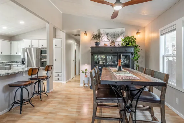 a view of a dining room with furniture