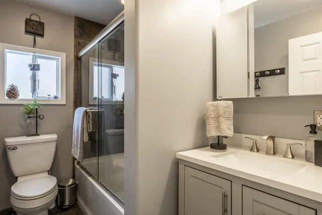 a view of a workspace with furniture