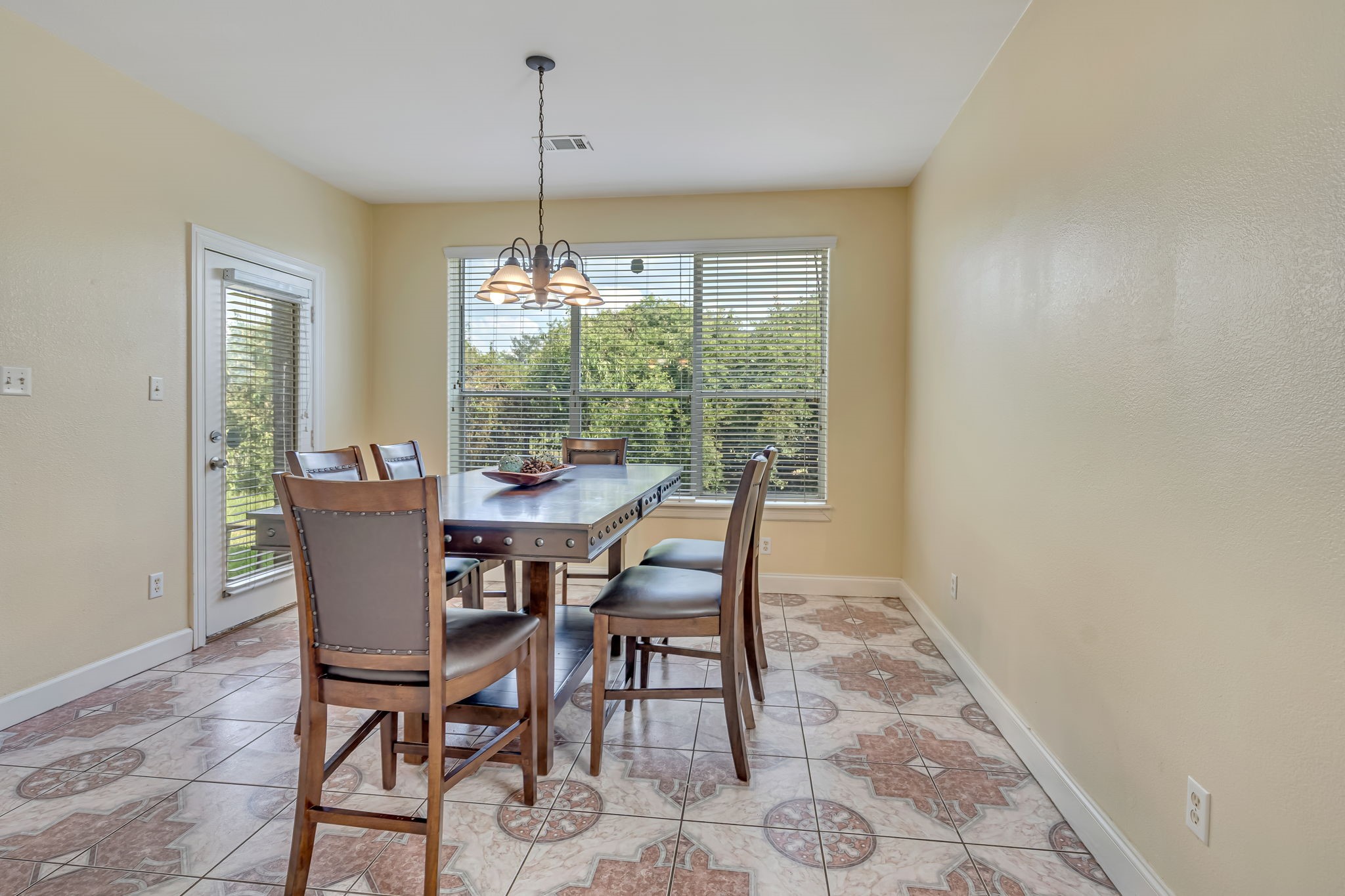 4810 Plum Forest Road Houston, TX 77084 - Photo 14 of 29 a dining room with furniture window and outside view