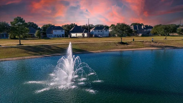 a view of a lake with a big yard