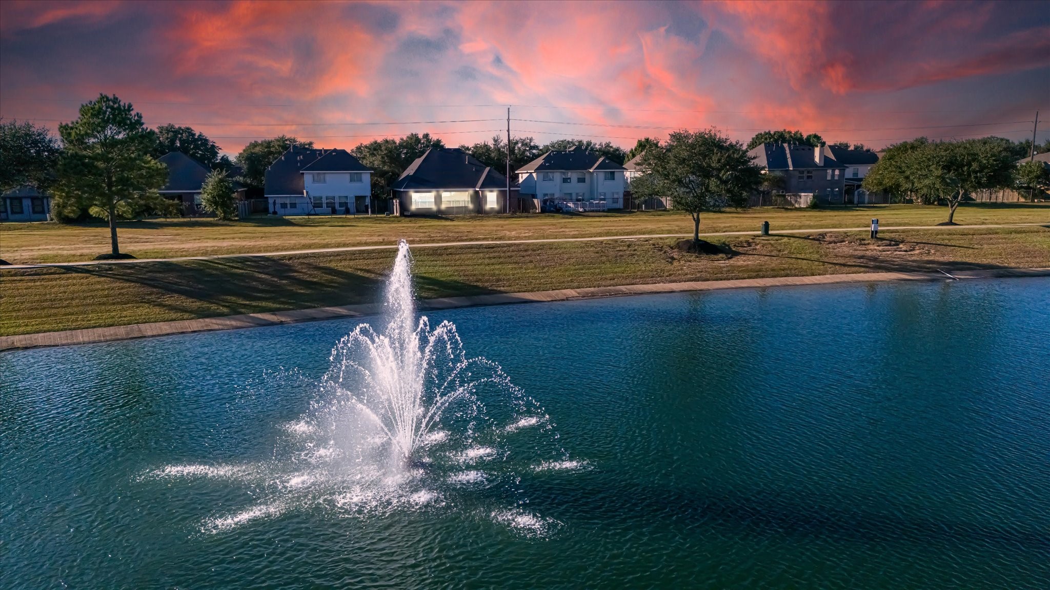 4810 Plum Forest Road Houston, TX 77084 - Photo 7 of 29 a view of a lake with a big yard