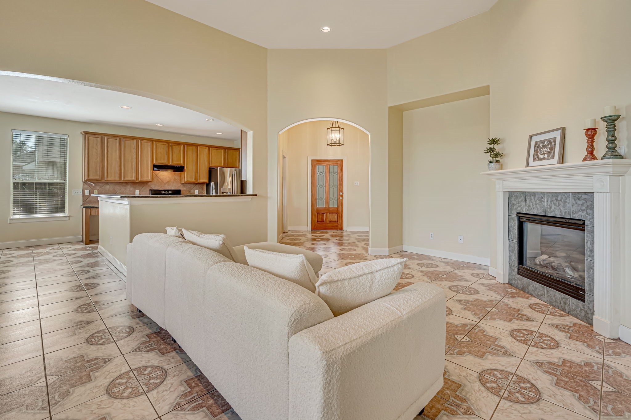 4810 Plum Forest Road Houston, TX 77084 - Photo 10 of 29 a living room with furniture and a fireplace
