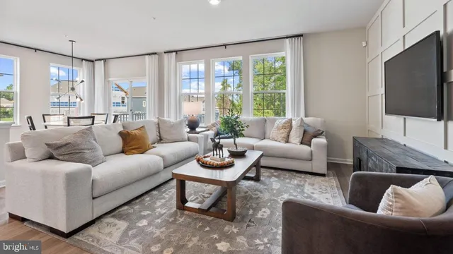 a view of a livingroom with furniture and window