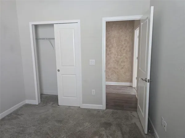 an empty room with closet