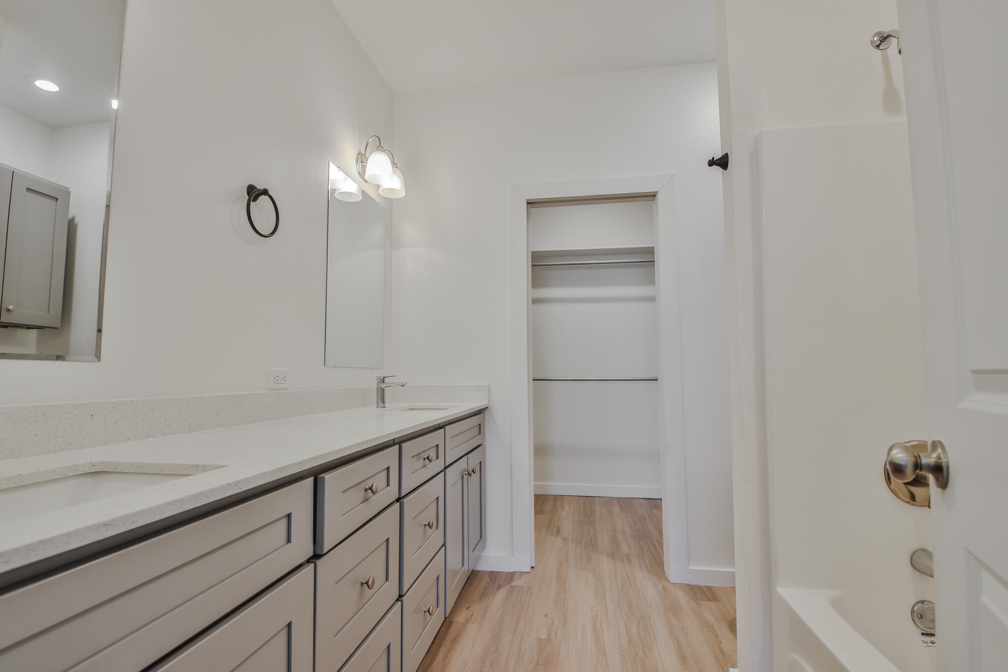5506 Itasca Street Lubbock, TX 79416 - Photo 14 of 15 a bathroom with a sink a shower and a mirror