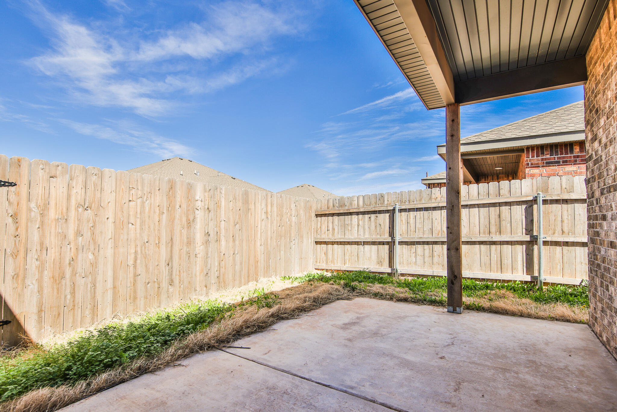 5506 Itasca Street Lubbock, TX 79416 - Photo 15 of 15 a view of a backyard with a garden