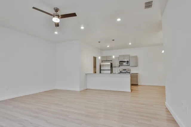 a view of kitchen and sink