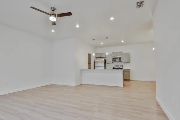 a view of kitchen and sink