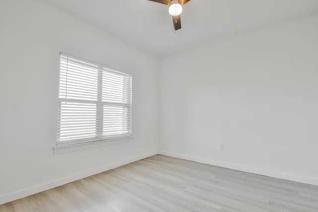 an empty room with a window