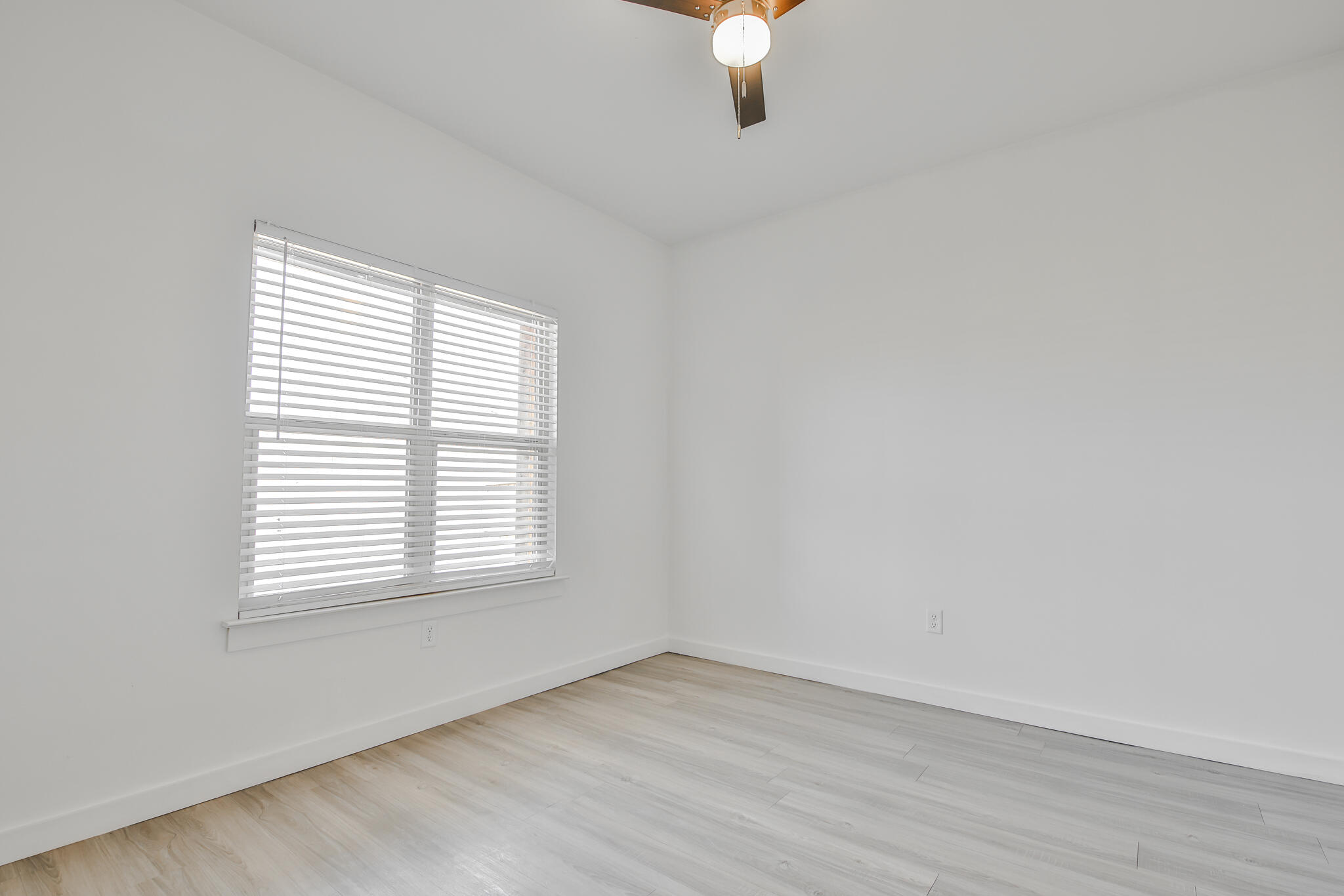 5506 Itasca Street Lubbock, TX 79416 - Photo 10 of 15 an empty room with a window