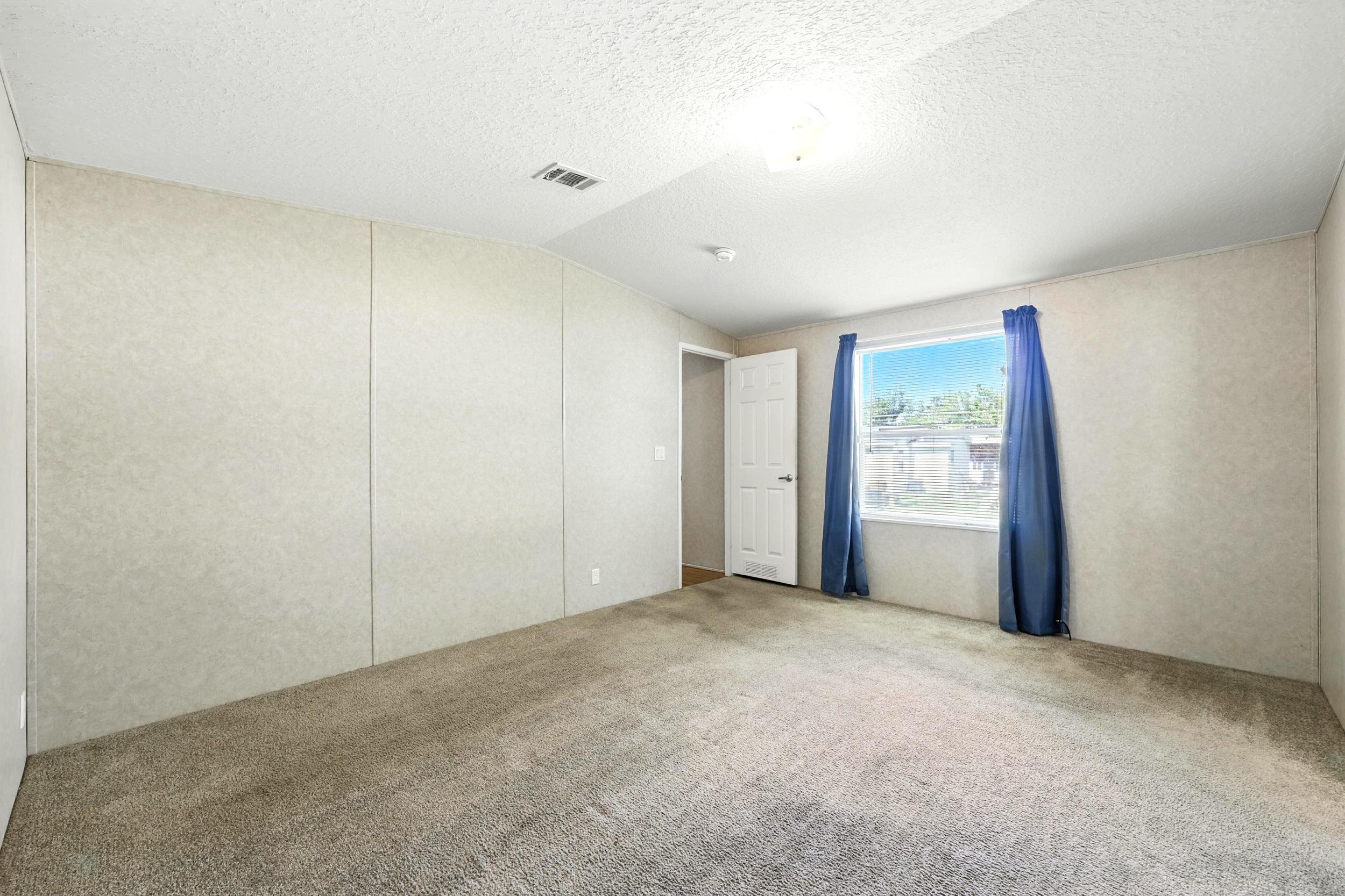 300 East Carter Street Hastings, FL 32145 - Photo 16 of 41 a view of a livingroom with an empty space and window