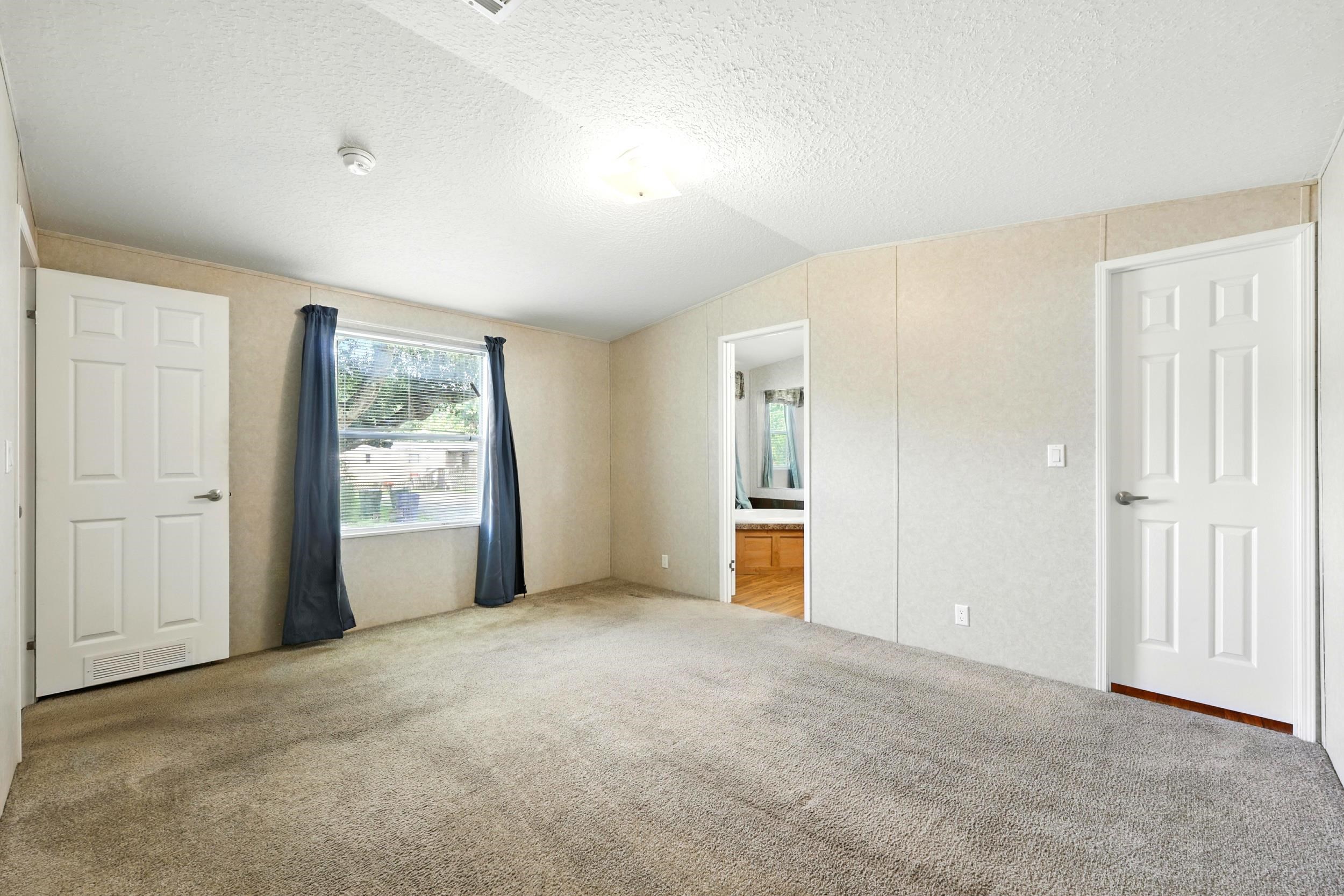 300 East Carter Street Hastings, FL 32145 - Photo 17 of 41 a view of empty room with windows
