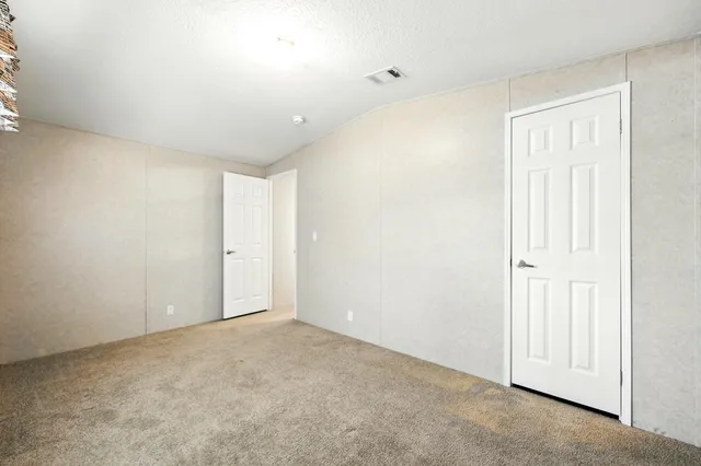 a view of a backyard with a garden