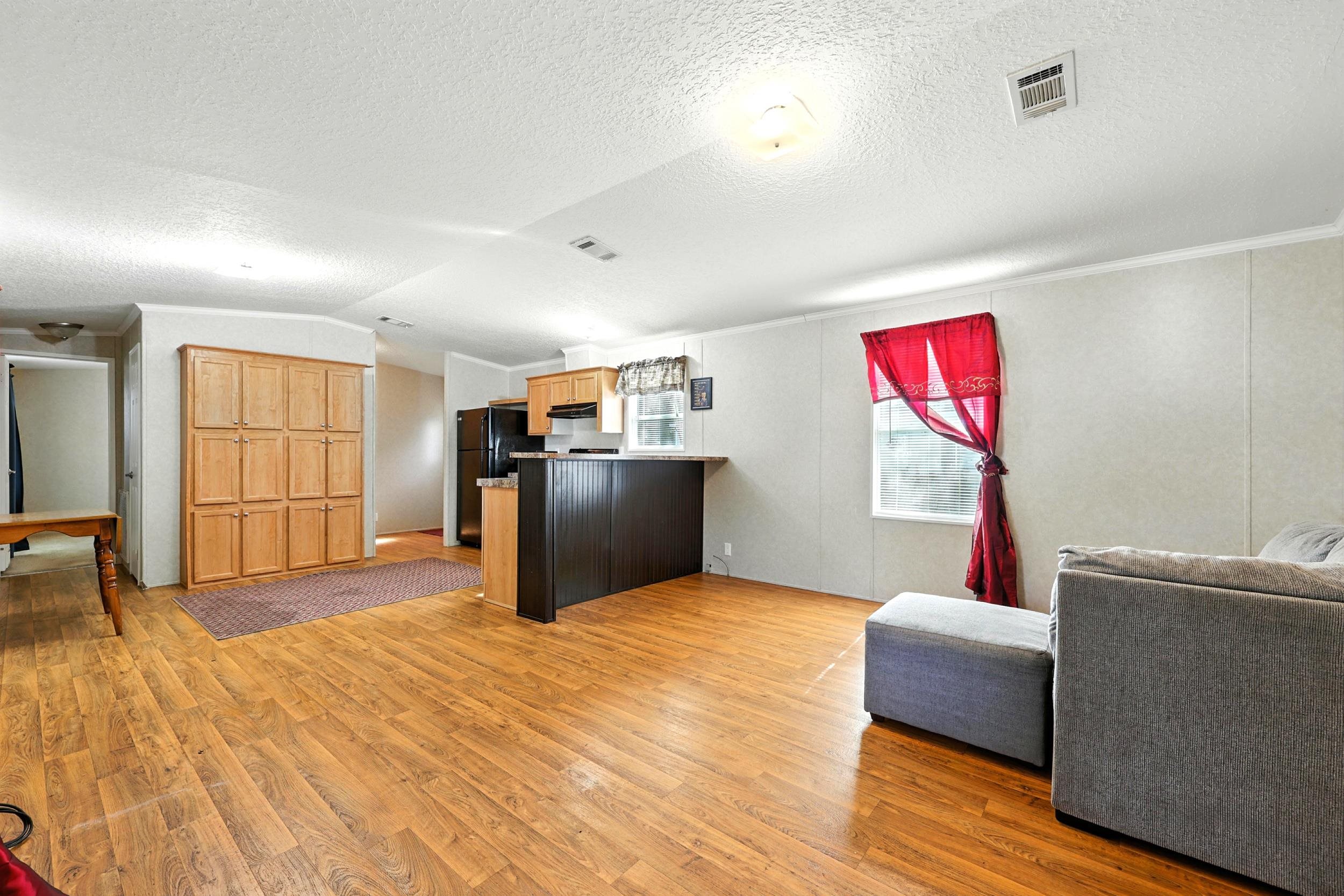 300 East Carter Street Hastings, FL 32145 - Photo 5 of 41 a bedroom with furniture and a window