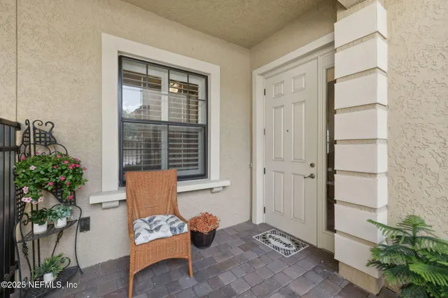 a kitchen with stainless steel appliances granite countertop a sink and a counter top space