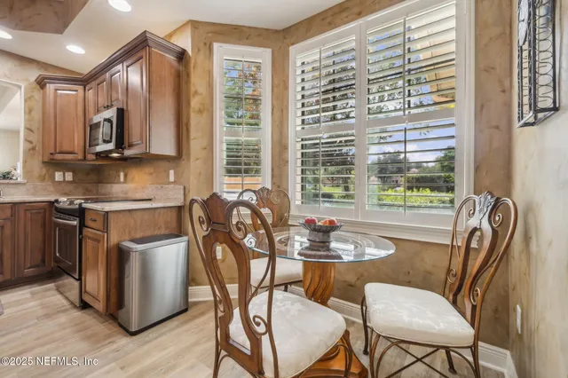 a bed room with a bed and a lamp