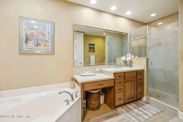 a front view of a house with a yard garage and outdoor seating