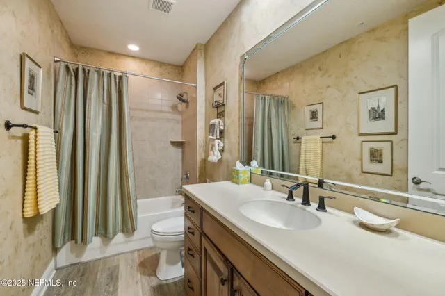 an aerial view of a house with outdoor space