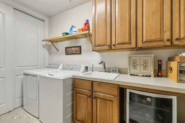 an aerial view of a house with a lake view