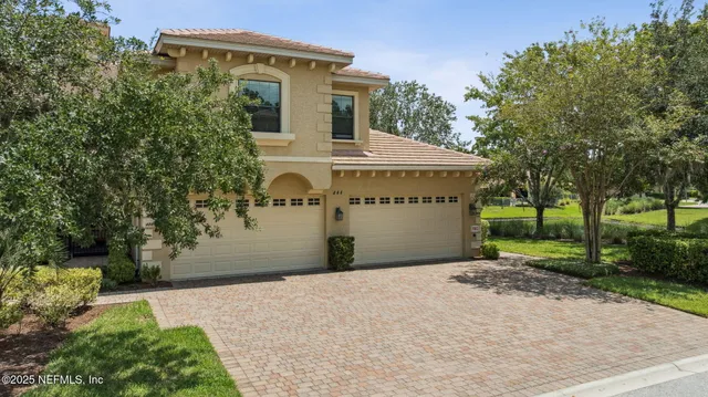 a living room with fireplace furniture and a flat screen tv