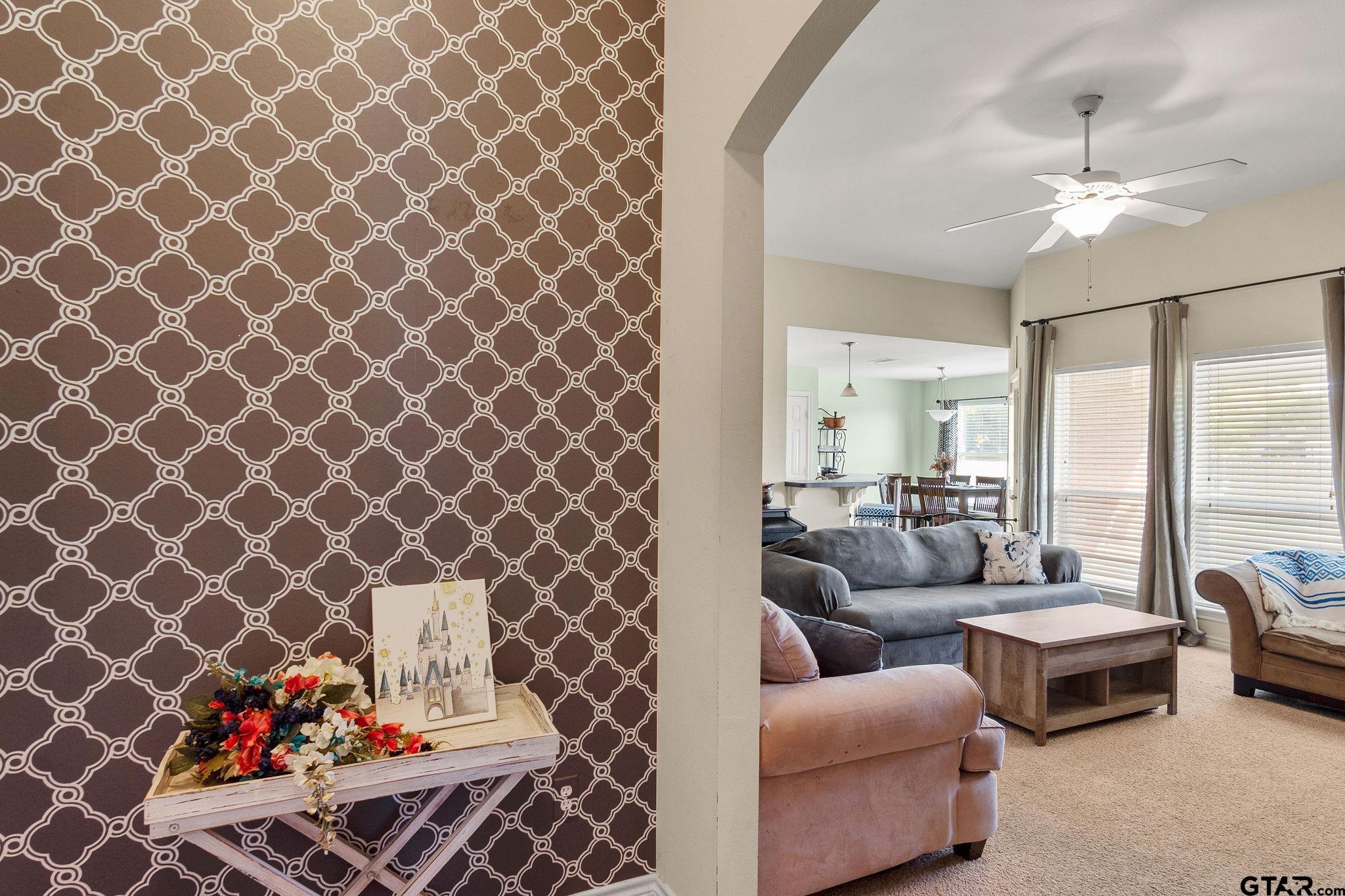 11269 Twin Spires Drive Flint, TX 75762 - Photo 2 of 23 a living room with furniture and a floor to ceiling window