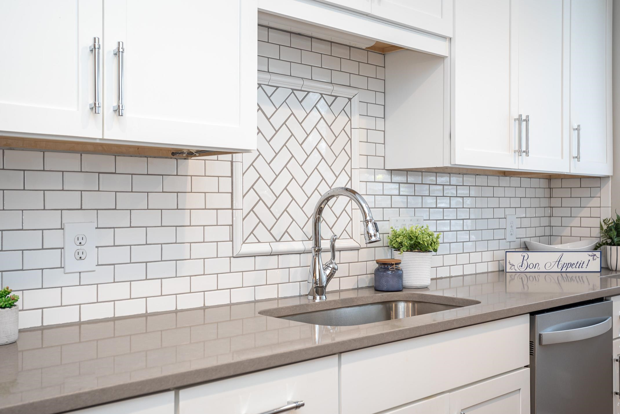 2943 Wycliff Road Raleigh, NC 27607 - Photo 14 of 31 a kitchen with a sink and cabinets