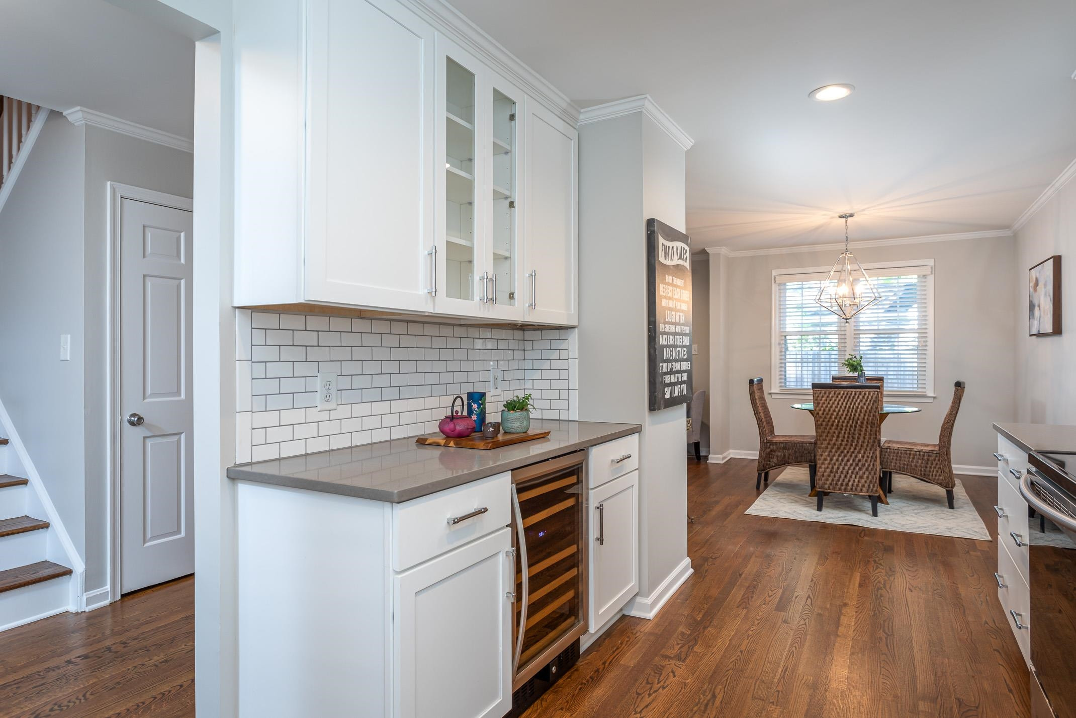 2943 Wycliff Road Raleigh, NC 27607 - Photo 16 of 31 a kitchen with a sink and wooden floor