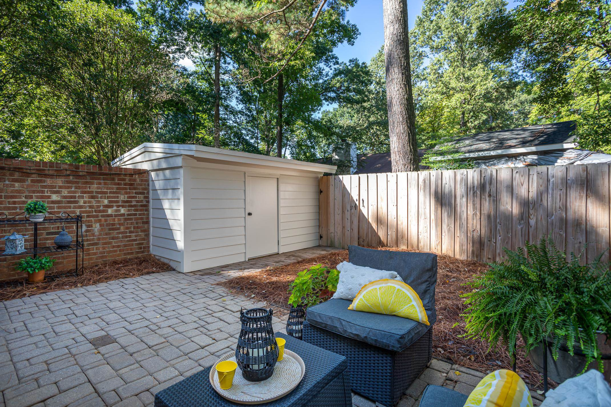 2943 Wycliff Road Raleigh, NC 27607 - Photo 20 of 31 a backyard of a house with seating space