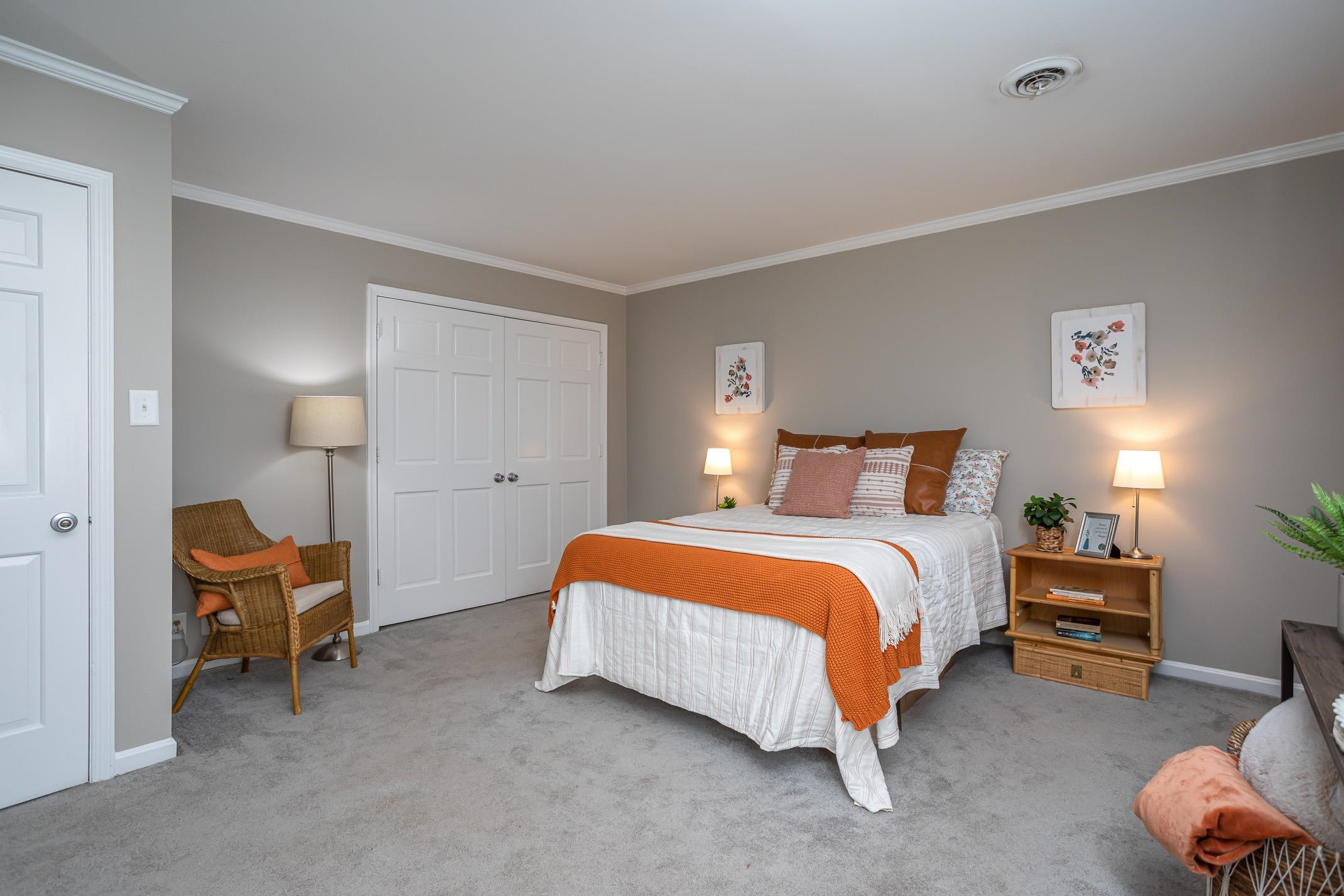 2943 Wycliff Road Raleigh, NC 27607 - Photo 24 of 31 a bedroom with bed and lamp