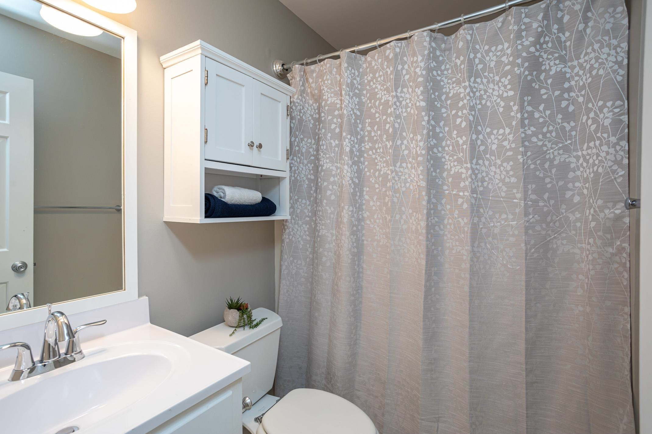 2943 Wycliff Road Raleigh, NC 27607 - Photo 28 of 31 a bathroom with a sink and a toilet