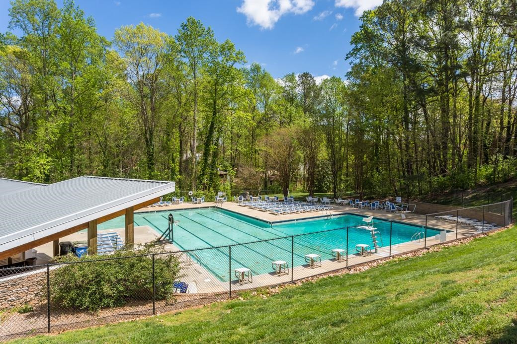 2943 Wycliff Road Raleigh, NC 27607 - Photo 30 of 31 a view of a house with pool and a yard