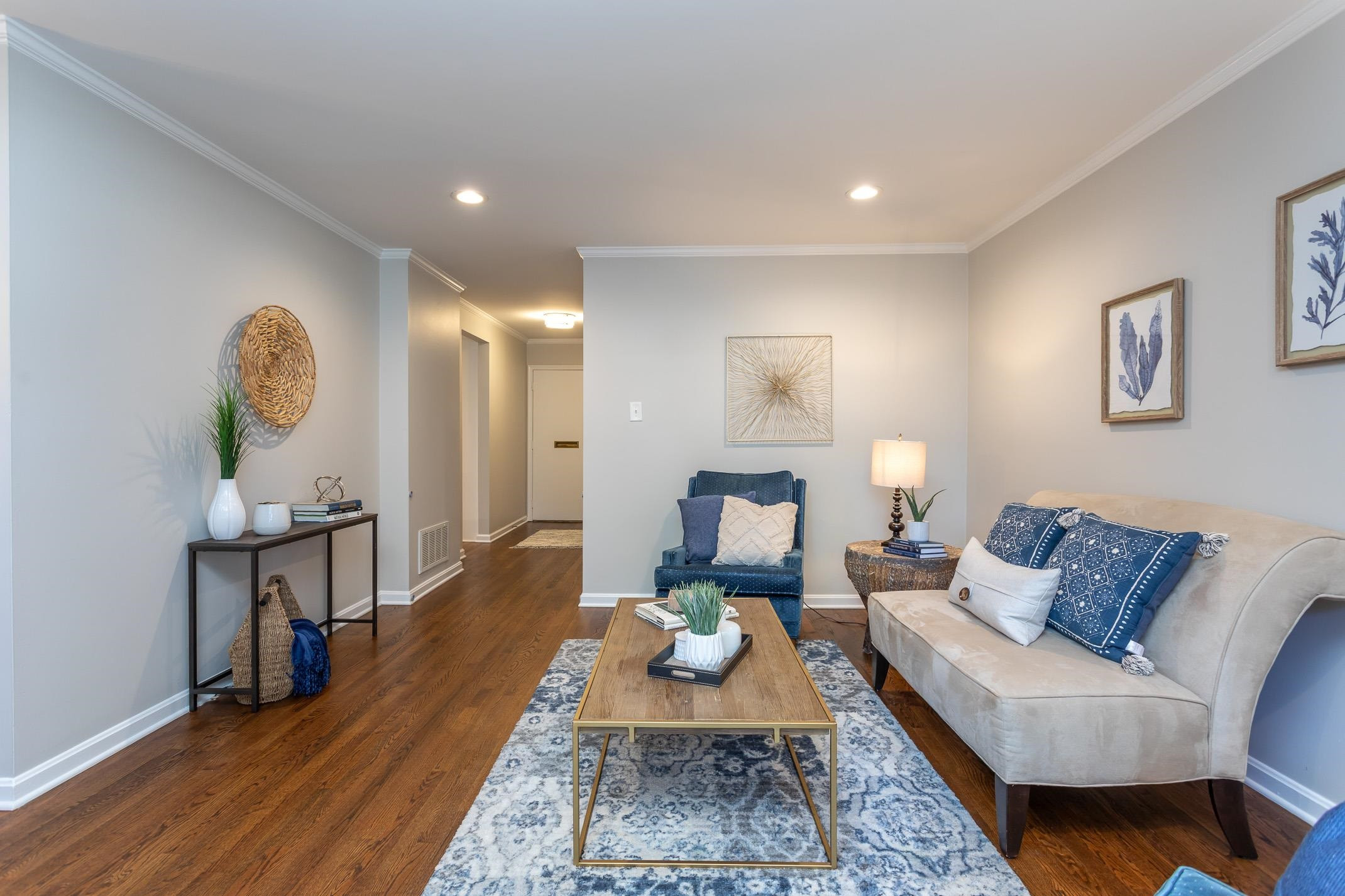 2943 Wycliff Road Raleigh, NC 27607 - Photo 6 of 31 a living room with furniture a rug and a table
