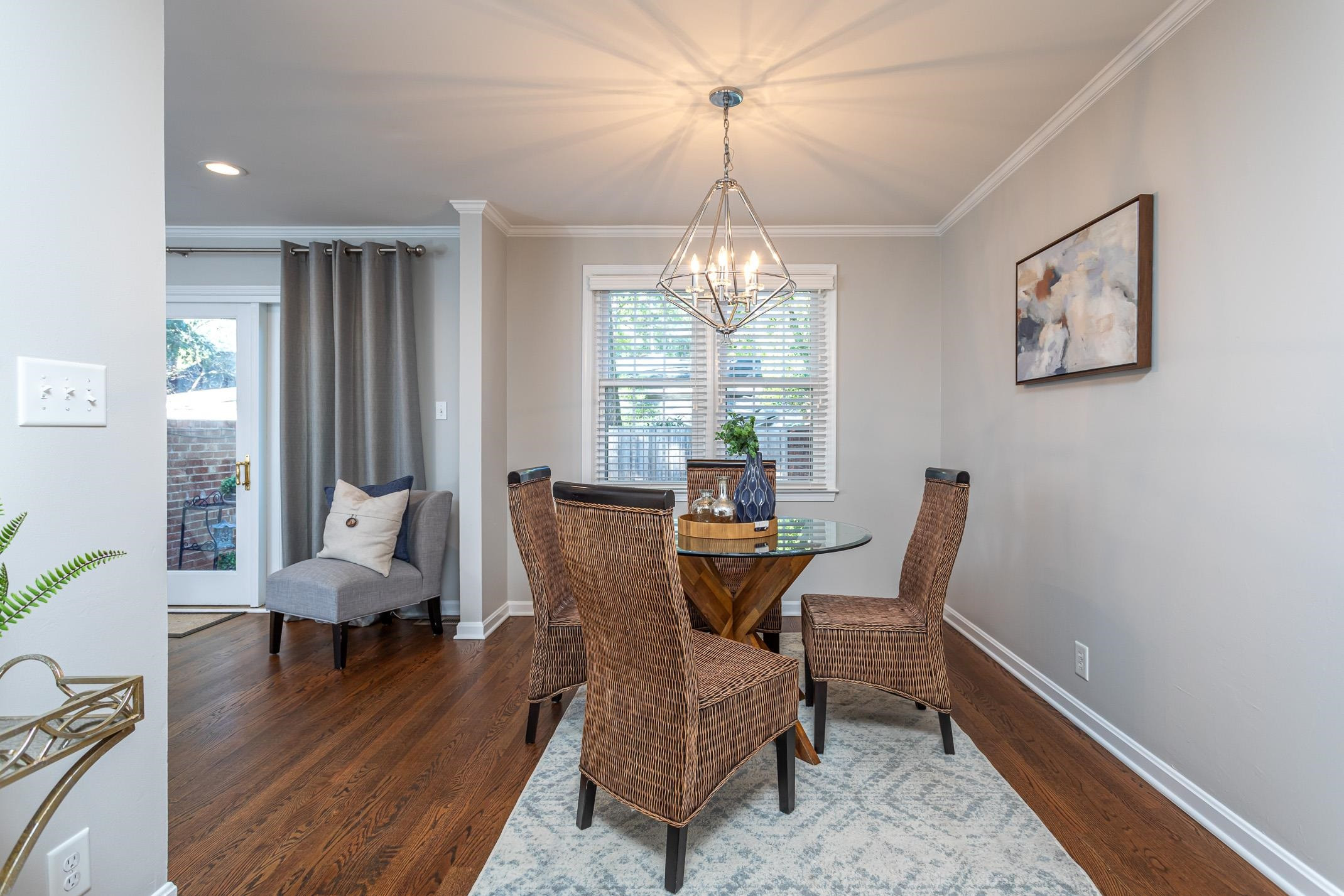 2943 Wycliff Road Raleigh, NC 27607 - Photo 8 of 31 a view of a dining room with furniture window and wooden floor