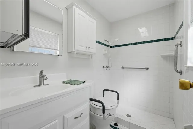 a bathroom with a sink and a shower