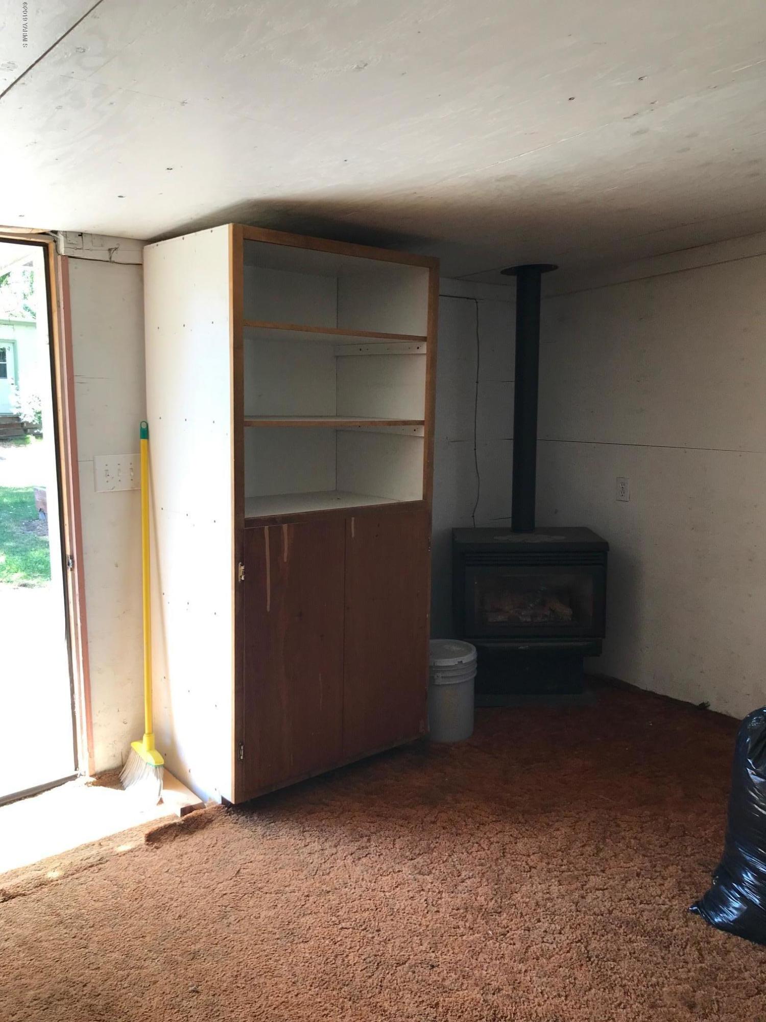 4031 Bell Road Yakima, WA 98901 - Photo 10 of 28 a view of an empty room with a fireplace