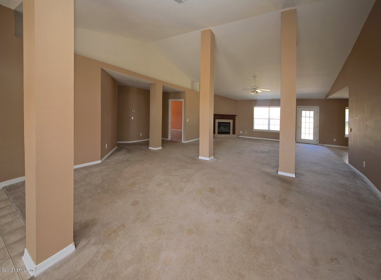 2876 Longleaf Ranch Circle Middleburg, FL 32068 - Photo 5 of 20 Great Room to Dining Room