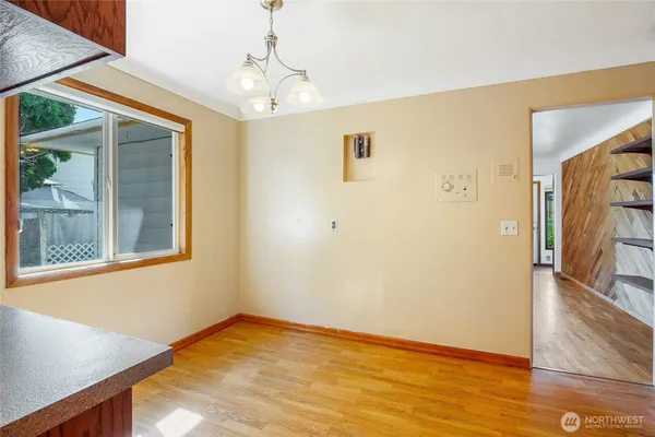 a kitchen with stainless steel appliances granite countertop a sink and cabinets