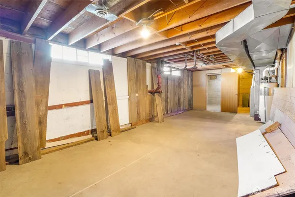 a view of a room with wooden walls