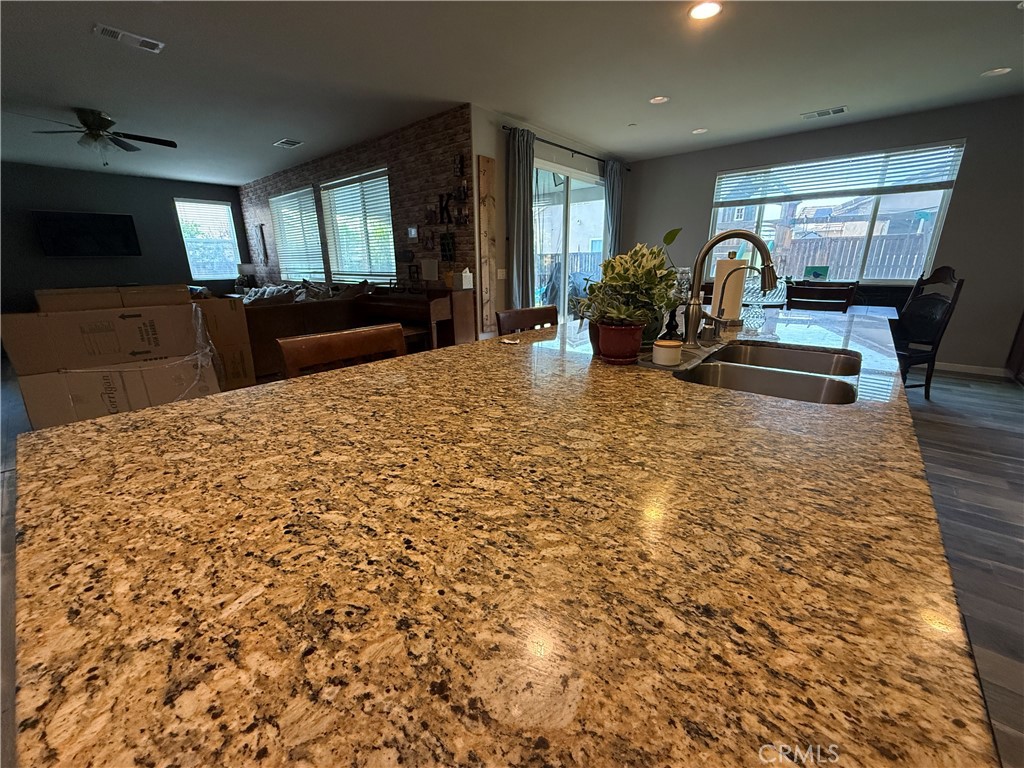 30130 Pine Needle Road Menifee, CA 92585 - Photo 23 of 45 a living room with furniture and a flat screen tv
