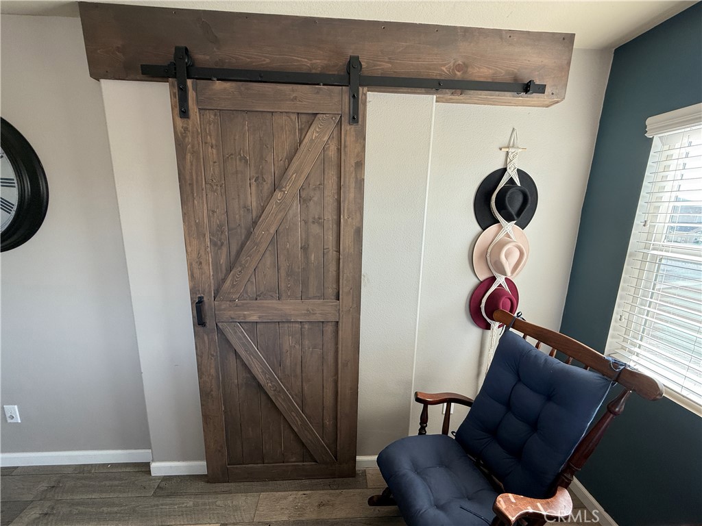 30130 Pine Needle Road Menifee, CA 92585 - Photo 26 of 45 a living room with a couch and a window