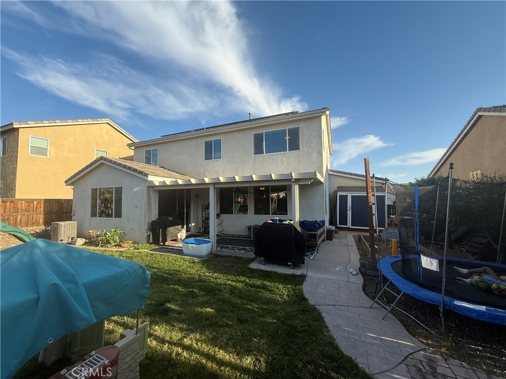 30130 Pine Needle Road Menifee, CA 92585 - Photo 43 of 45 a view of a house with backyard and sitting area