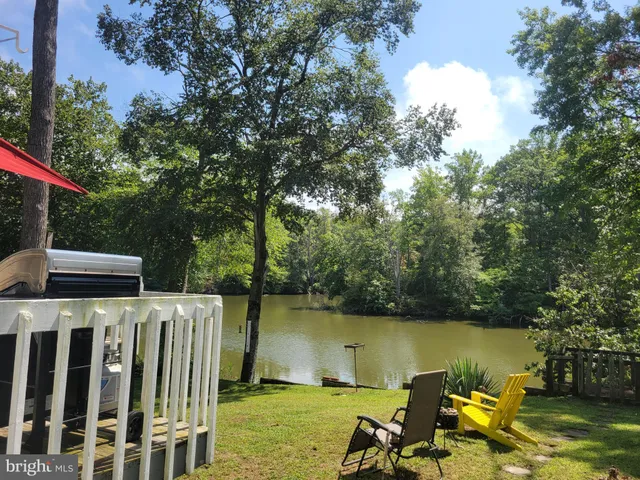 a view of a lake with a deck